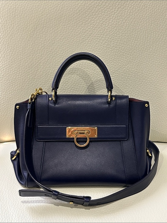 Salvatore Ferragamo Handbags - Salvatore Ferragamo Sofia Small Satchel in navy blue with gold-tone hardware.
